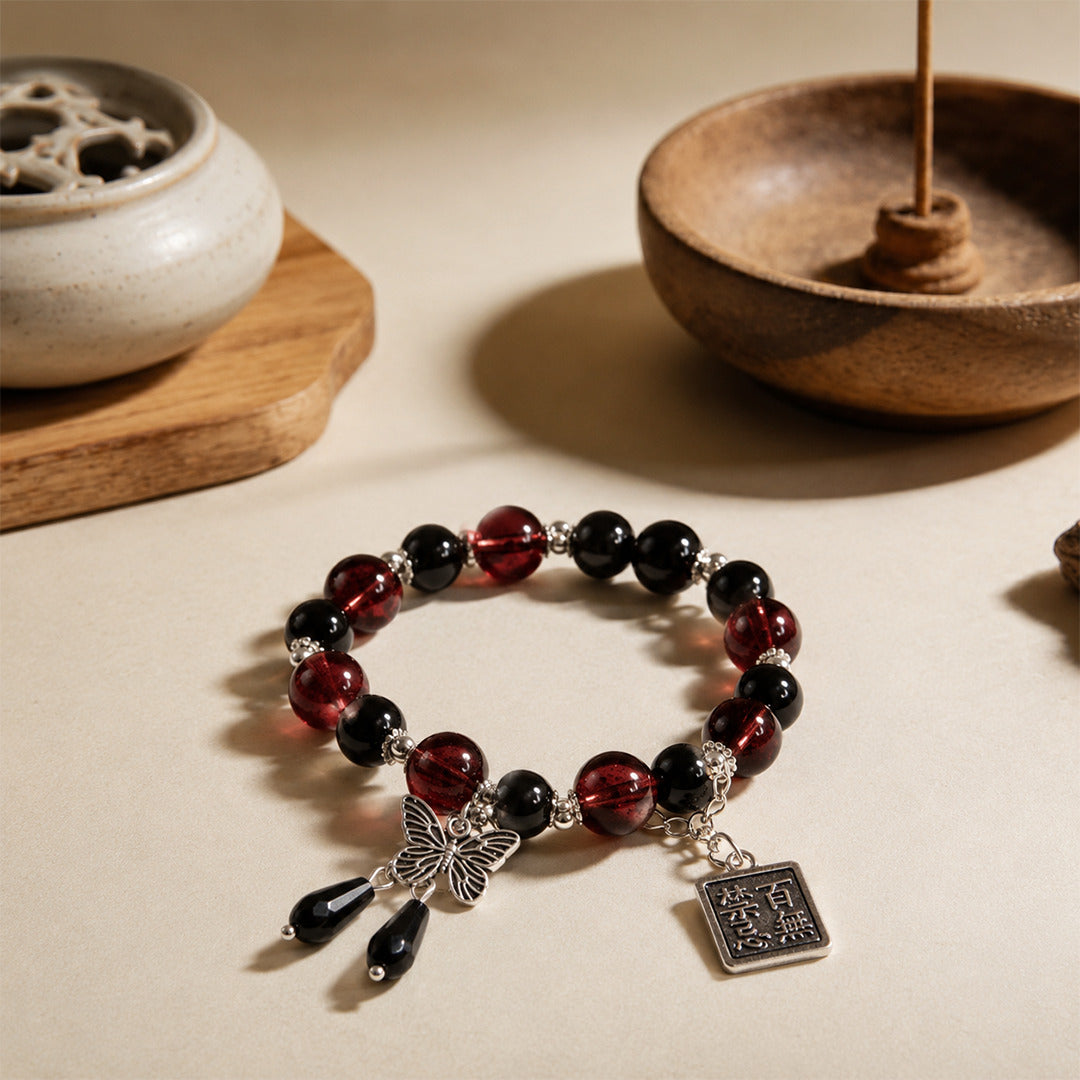 Fire Bracelet — Garnet & Black Onyx Butterfly Charm