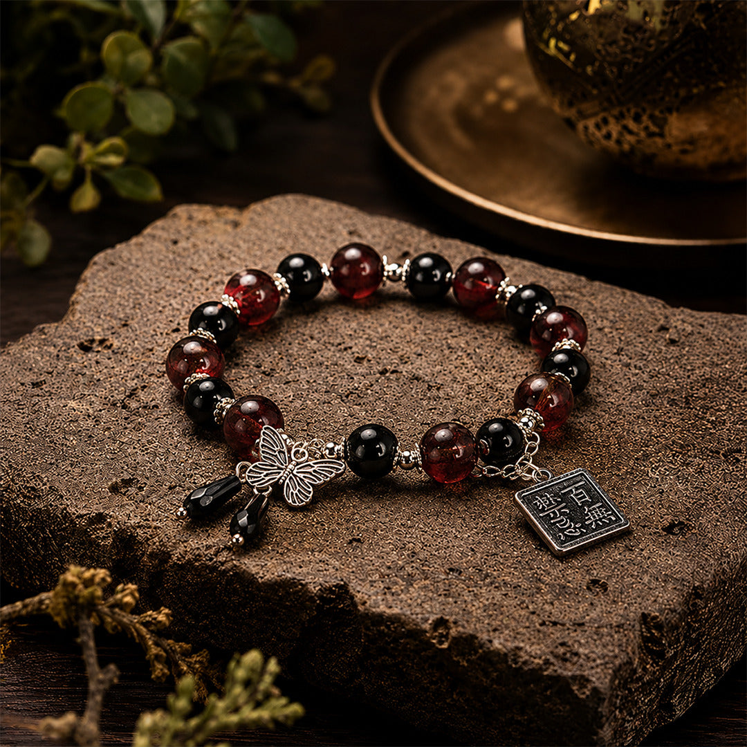 Fire Bracelet — Garnet & Black Onyx Butterfly Charm