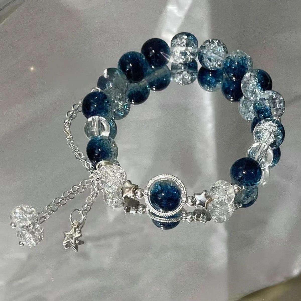 Blue Crackle Crystal Bead Bracelet with Silver Charms